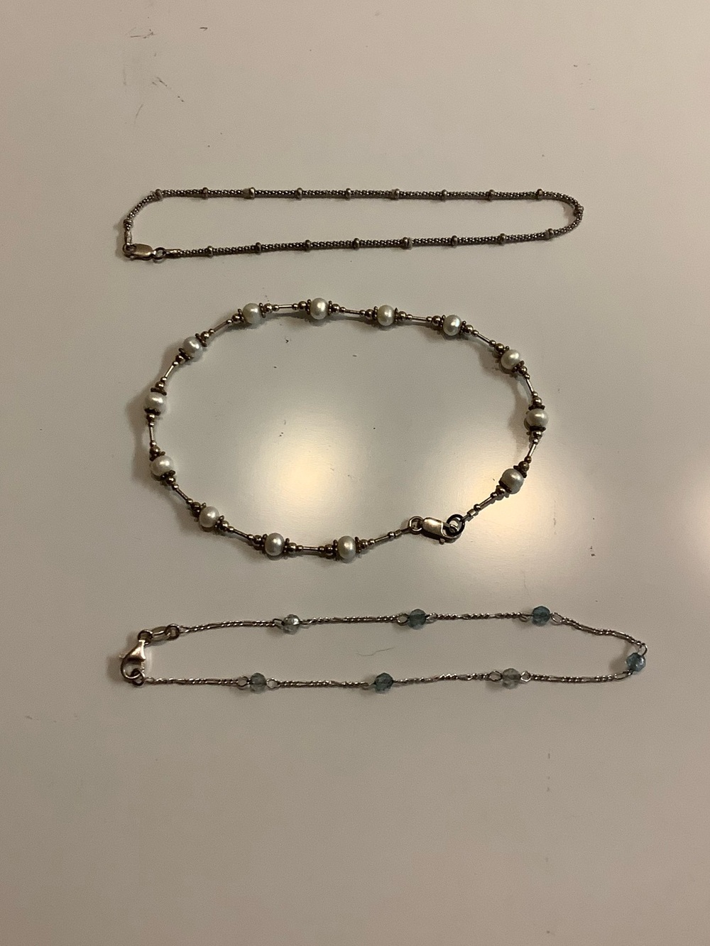 Three Silver Ankle Bracelets